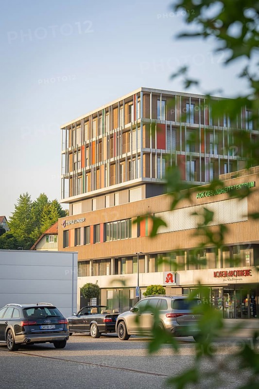 Office building on a street with cars and modern architecture, Nagold, district of Calw, Black Forest, Germany