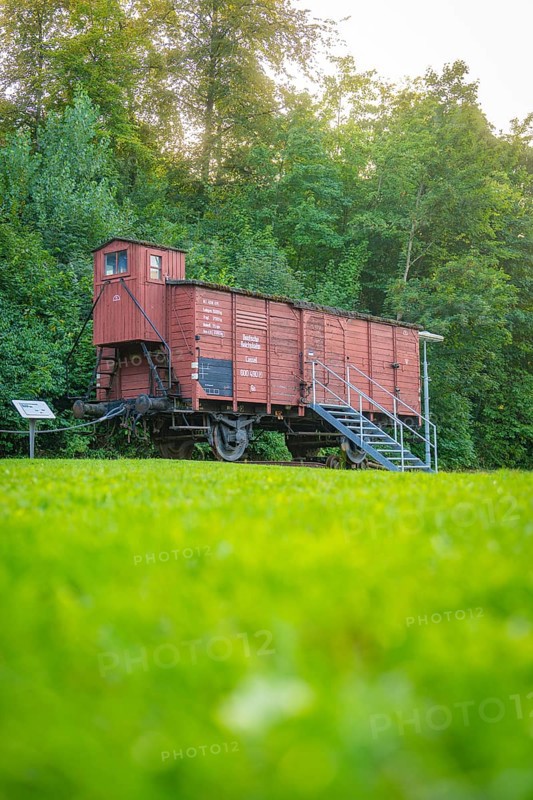 Historic goods wagon in a green setting with summer trees, Nagold, district of Calw, Black Forest, Germany