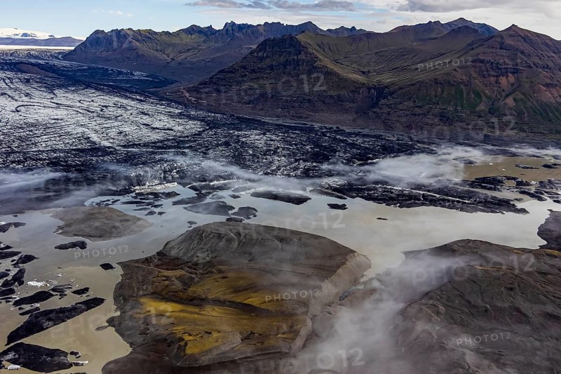 Icebergs, ice floes, glacier tongue, glacier edge, glacier, lake, glacier lagoon, aerial view, black ice, climate change, summer, mountains, Skeidararjökull, Skaftafell, Vatnajökull National Park, Iceland