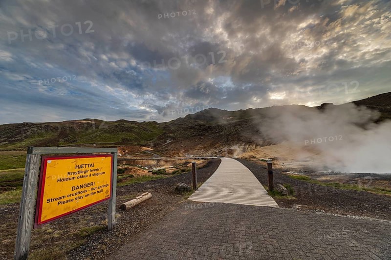 Hot springs, geothermal field, danger sign, cloudy, evening mood, backlight, summer, Krysuvik, Reykjanes Peninsula, Iceland