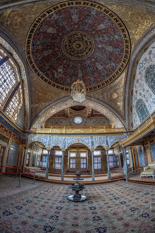 Intricate details and opulent design showcased in the ornately decorated interior of topkapi palace, a historical landmark in istanbul, turkey