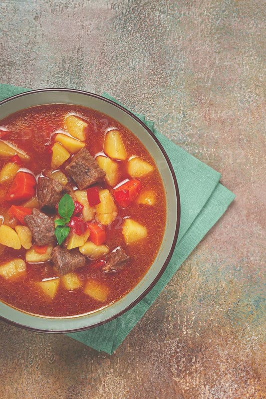 Meat goulash, with potatoes and carrots, sweet pepper, traditional Hungarian soup, homemade, no people