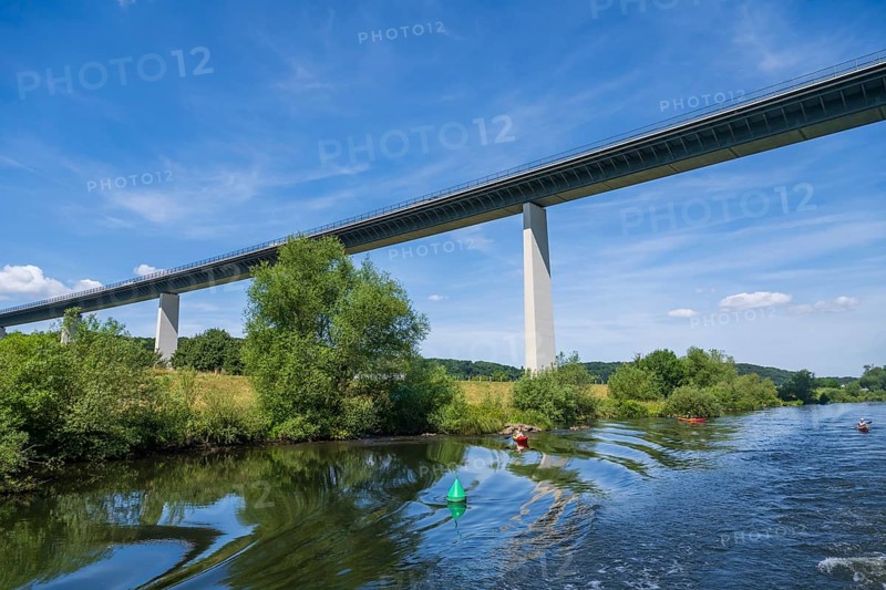 Motorway bridge A 52 over the Ruhr, from below, kayaker on the water, Mülheim an der Ruhr, Rur area, North Rhine-Westphalia, Germany