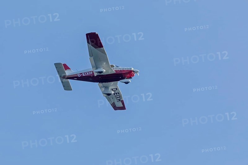 Single-engine aeroplane over Falckenstein, Kiel Fjord, Kiel, Schleswig-Holstein, Germany