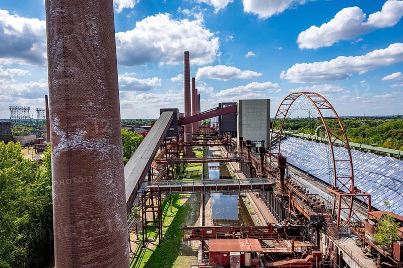 The Zollverein coking plant, backdrop to the once largest central coking plant in Europe, closed in 1993, part of the Zollverein Coal Mine Industrial Complex UNESCO World Heritage Site, Essen, North Rhine-Westphalia, Germany