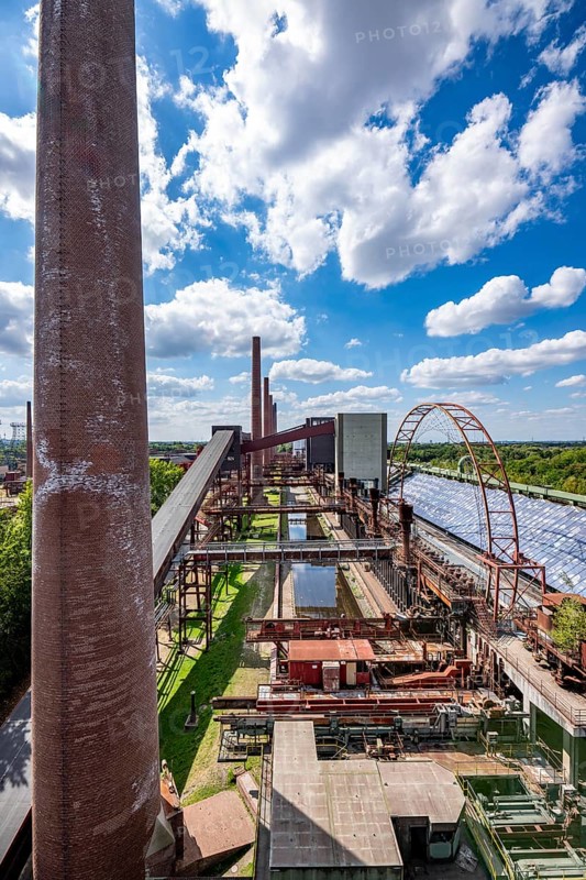 The Zollverein coking plant, backdrop to the once largest central coking plant in Europe, closed in 1993, part of the Zollverein Coal Mine Industrial Complex UNESCO World Heritage Site, Essen, North Rhine-Westphalia, Germany