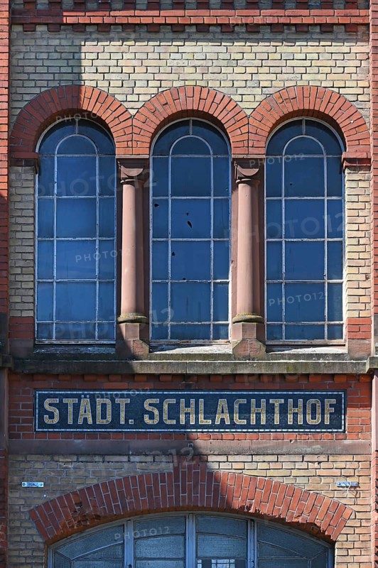 Detail of the main entrance to the former municipal abattoir, built between 1905 and 1906, Wasserstraße 22, Offenburg, Baden-Württemberg, Germany