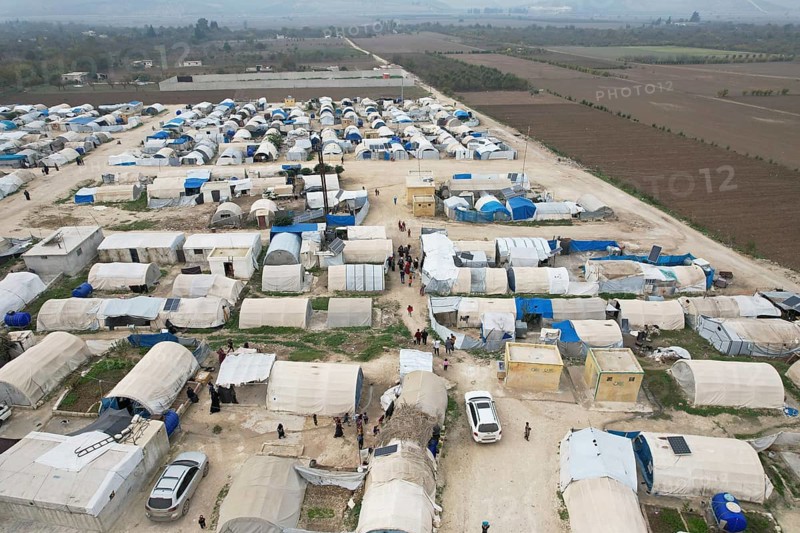 Aerial photo showing dozens of makeshift tents housing Syrian refugees near the Turkish border under difficult humanitarian conditions. Aleppo, Syria November 25, 2023, Aleppo, Syria
