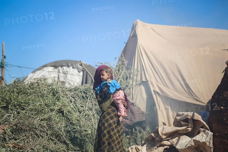 A Syrian refugee child photographed in a camp, reflecting the harsh living conditions of displaced families. Aleppo, Syria. October 29, 2022, Aleppo, Syria
