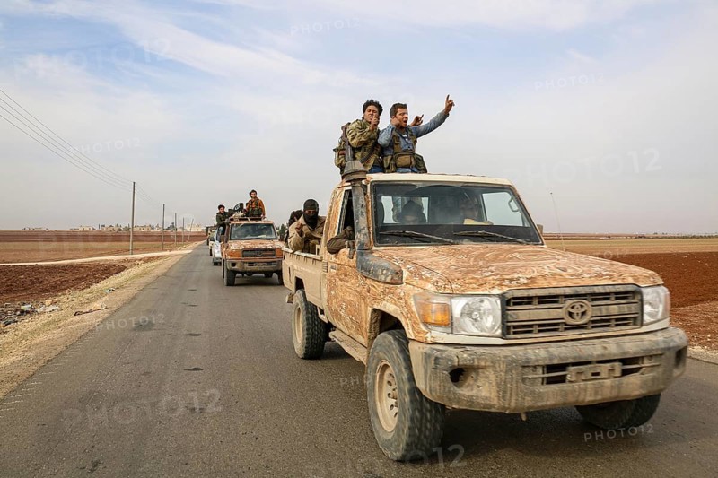 Fighters from the Free Syrian Army celebrate victory after capturing villages that were under the control of ISIS. Aleppo, Syria November 12, 2016, Aleppo, Syria