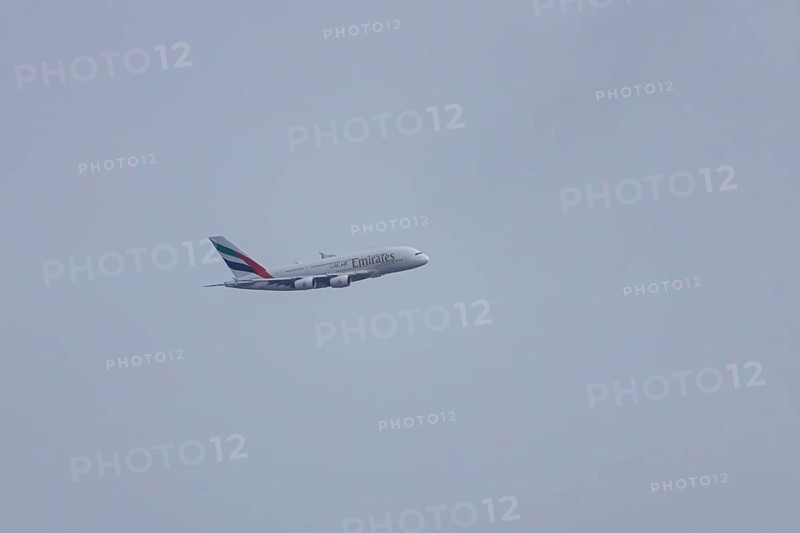 Airbus A380 jet passenger aircraft of Emirates airlines flying, England, United Kingdom
