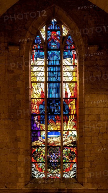 Stained glass window at necropolis with graves of Belgian World War One soldiers buried in the church of Grimde near Tienen, Tirlemont, Belgium