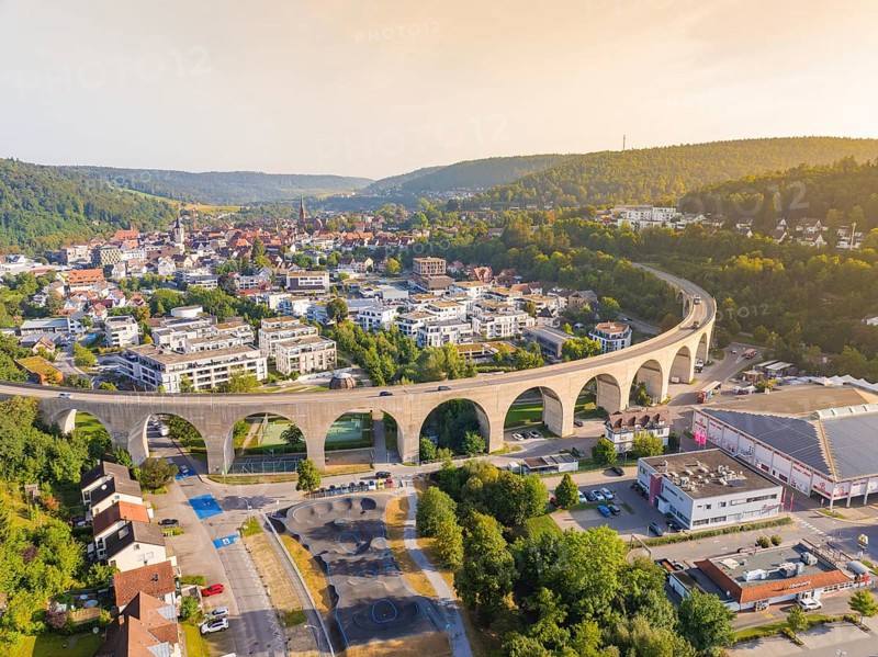 Large viaduct in a town, framed by hills and evening atmosphere, Nagold, district of Calw, Black Forest, Germany