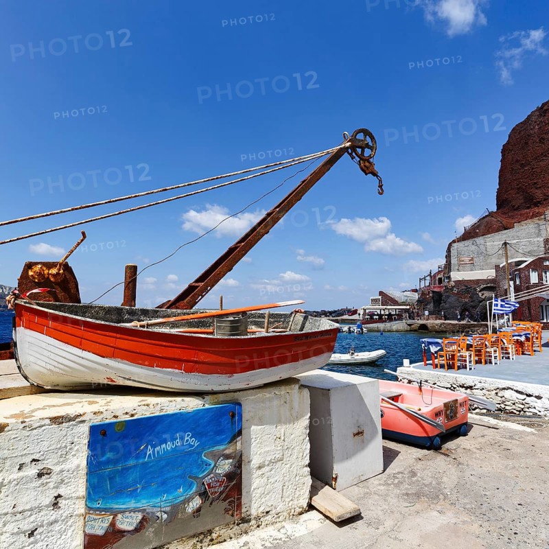 Sign with inscription Ammoudi Bay, fishing harbour, rowing boat, harbour facilities, fish restaurant, Oia, Thira, Santorini, Cyclades, Greece