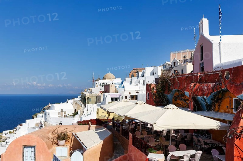 Terrace of a restaurant overlooking the sea, Oia, Thira, Santorini, Cyclades, Greece