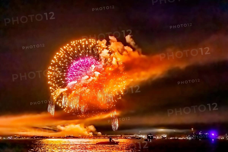 Lake Night Festival Constance. Water fireworks over the German shore and the neighbouring Swiss town of Kreuzlingen. View of the fireworks from Lake Constance. Constance, Baden-Württemberg, Germany