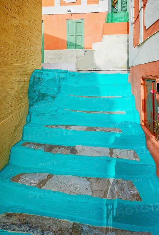 Colourful painted alley, Chorio, Symi Island, Dodecanese Islands, Greece