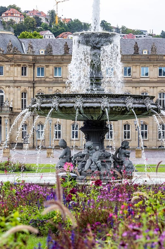 New Palace with Palace Square and fountain. City view of Stuttgart, Baden-Württemberg, Germany