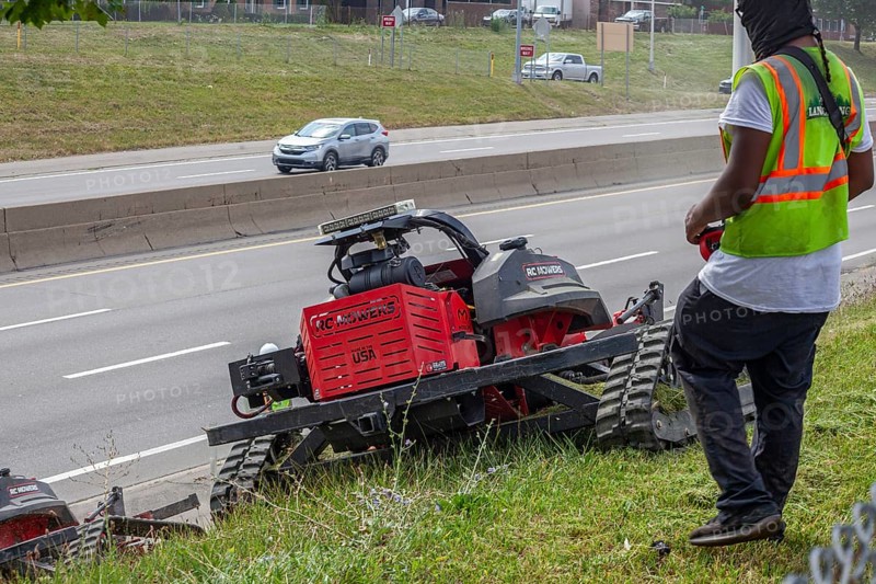 Harper Woods, Michigan, Remote-control mowers are cutting the grass and weeds along Interstate 94 and other freeways running through Detroit. The machines are said to be safer when operating on the steep embankments along most of the city's freeways