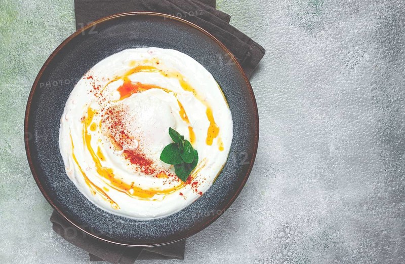 ?ilbir, traditional Turkish breakfast, Turkish eggs with yogurt and butter, homemade, no people