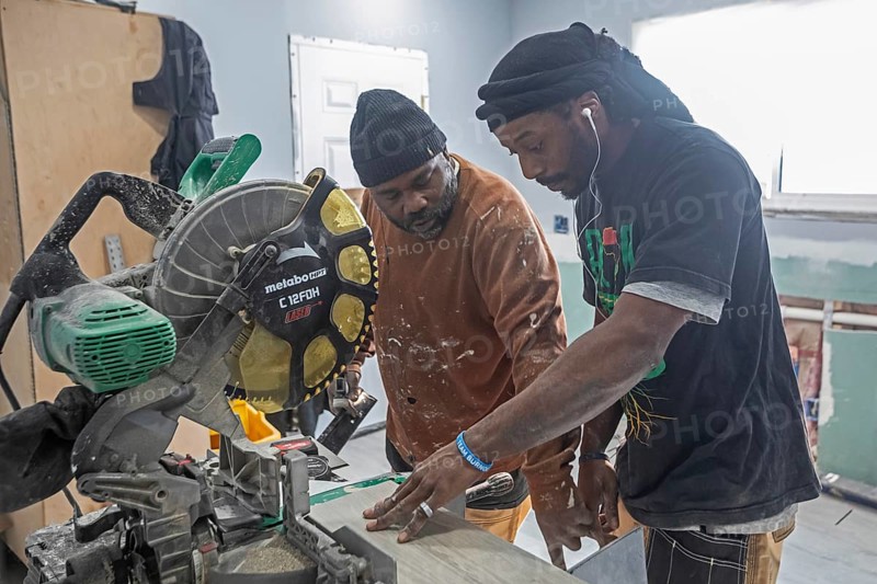 Detroit, Michigan - Workers remodel a house in the Morningside neighborhood that had been vacant for many years. Detroit lost nearly two-thirds of its residents from 1950 to 2020 but has been growing modestly in recent years