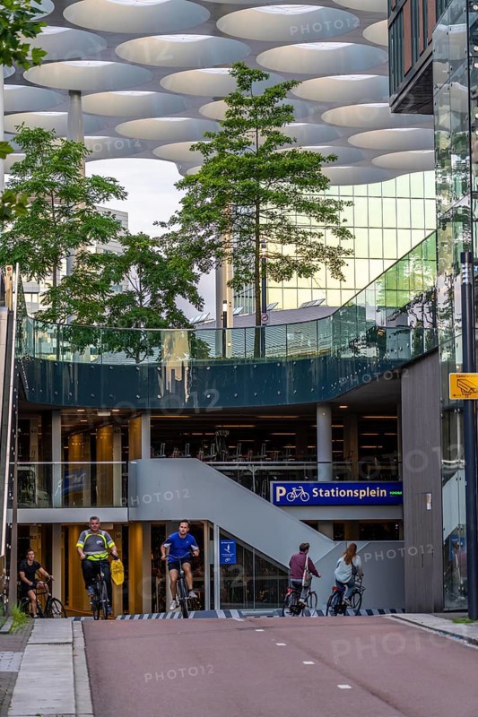 Entrance and exit to the central bicycle car park at Stationsplein, the largest bicycle car park in the world with over 13, 000 parking spaces on 3 floors, directly under the central station, Utrecht Centraal, Netherlands
