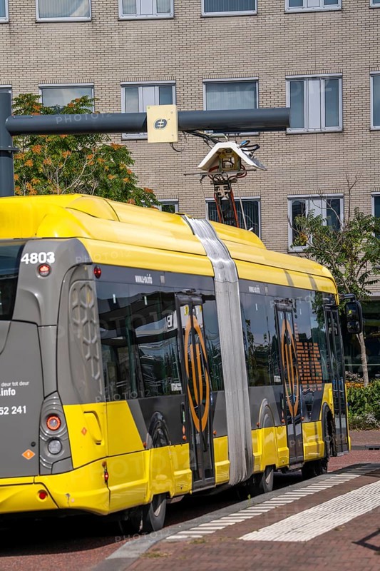 U-OV bus station at Utrecht-Lunetten railway station, electric bus, fast charging station via pantograph on the roof, direct connection of bus, train and cycle route, Netherlands