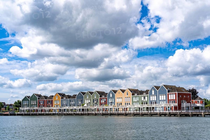 Small town of Houten near Utrecht, bicycles have priority in the town of 50, 000 inhabitants, generous cycle paths, many leisure areas, water areas, living by the water