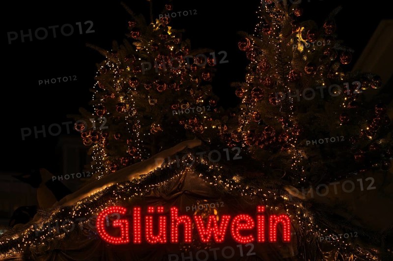 Night view, Glühwein lettering on Christmas stand, Christmas market, Stuttgart, Baden-Württemberg, Germany