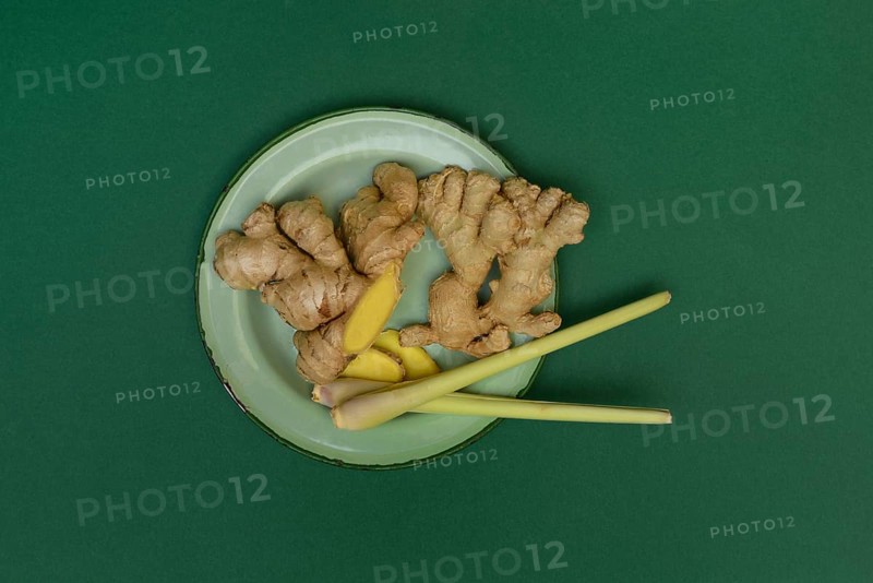 Ginger tubers and lemongrass on plate, Zingiber officinale, Cymbopogon citratus