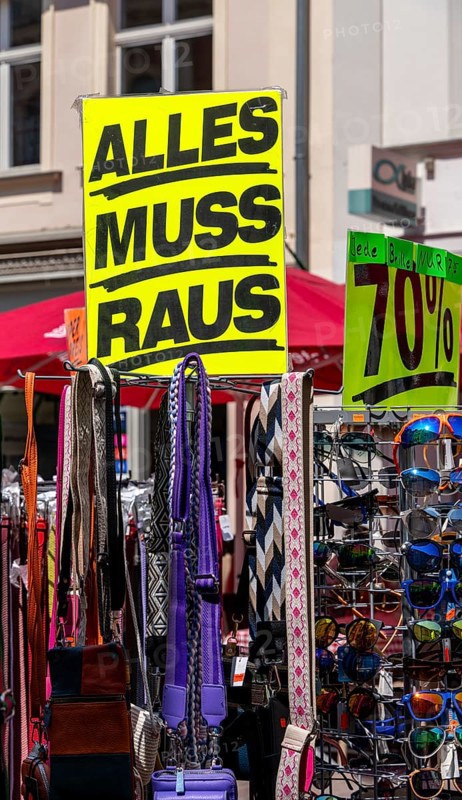 Retail trade with signs for price reductions and discounts, Potsdam, Brandenburg, Germany