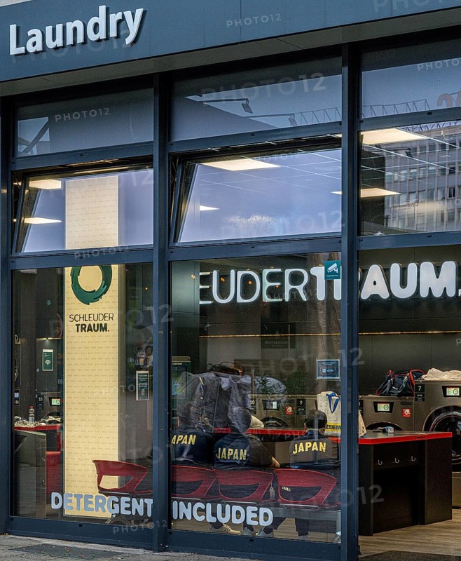 View from outside of a public laundromat, Alexanderplatz, Berlin, Germany