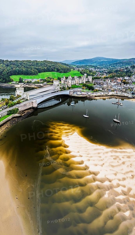 Conwy Castle over River Convy from a drone, Convy, North Wales, England, United Kingdom