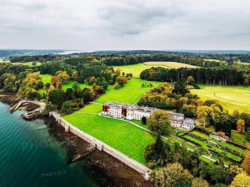 Autumn over Plas Newydd House from a drone, Gardens and Parkland, Llanfairpwllgwyngyll, Anglesey, Wales, UK