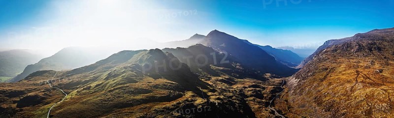 Autumn colours of Pen-y-Pass over Miner's Track, Start Point and road A4086 from a drone, Snowdonia, Wales, UK