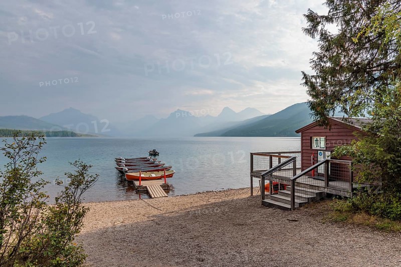 240903_044 Rental boats on a floating dock along the Lake McDonald shoreline at Apgar Village in Glacier National Park, Montana, USA