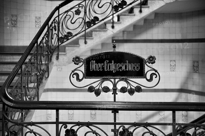 Interior view, sign upper ground floor, art nouveau, staircase, Alsterhaus, black and white, Free and Hanseatic City of Hamburg, Germany