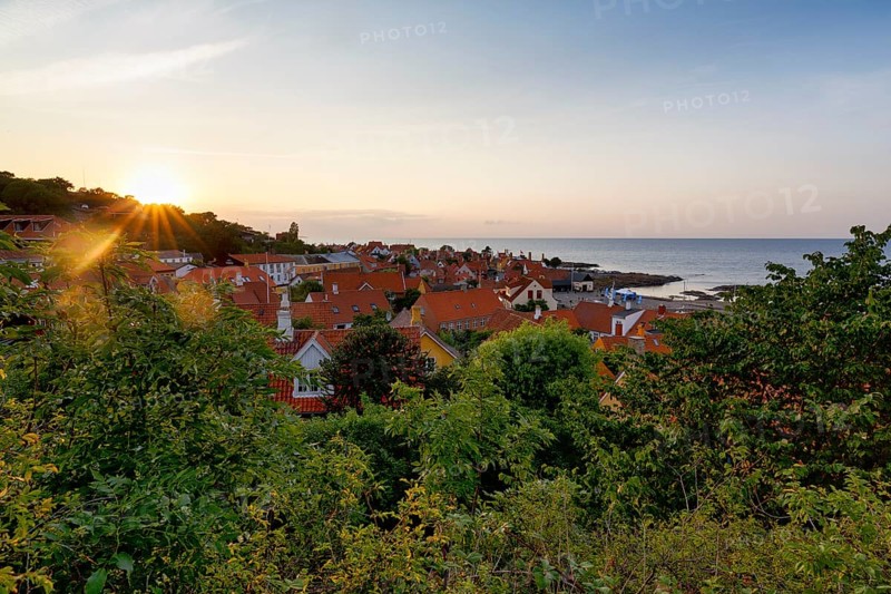 View of Gudhjem, view over the roofs of the Baltic Sea, sunset, sunbeams, Gudhjem, Bornholm, Baltic Sea, Denmark