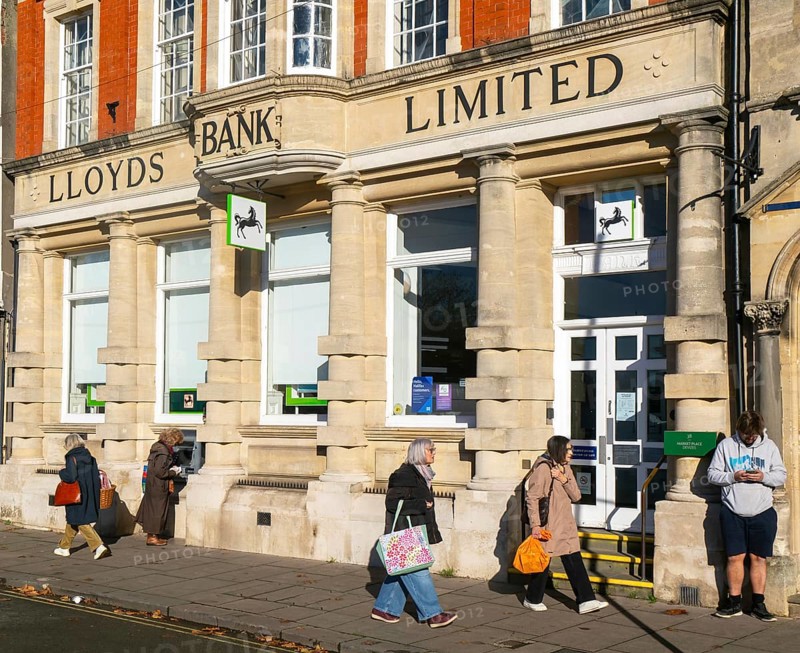 Lloyds bank Limited branch, Devizes, Wiltshire, England, UK people passing on street pavement