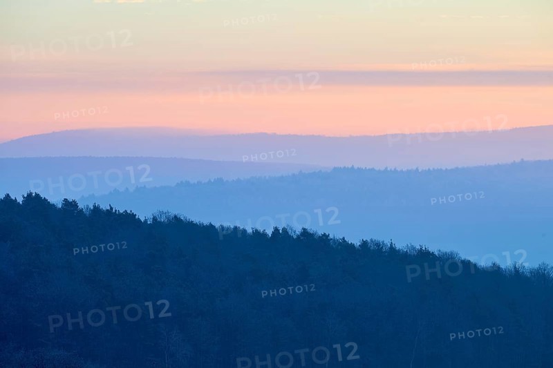 Shady hills and a calm pastel sky at sunset create a quiet atmosphere, Seckmauern, Lützelbach, Maintal, Odenwald, Hesse, Germany