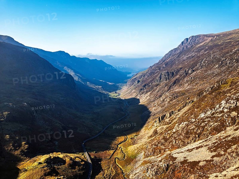 Autumn colours of Pen-y-Pass over Miner's Track, Start Point and road A4086 from a drone, Snowdonia, Wales, UK
