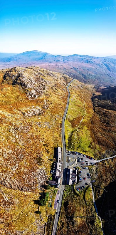 Autumn colours of Pen-y-Pass over Miner's Track, Start Point and road A4086 from a drone, Snowdonia, Wales, UK