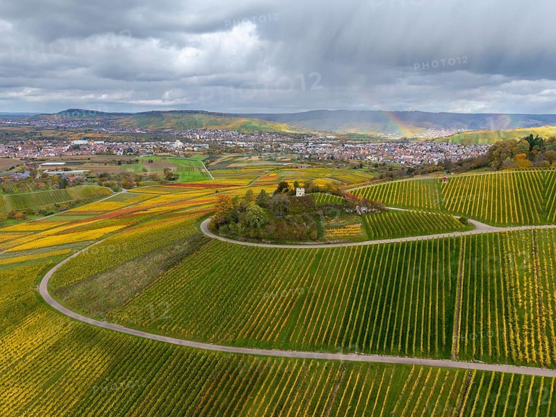 Wide landscape with vineyards and a rainbow under a cloudy sky, autumn, Schützenhüttle-Donkey, near Strümpfelbach im Remstal, Rems-Murr-Kreis, Baden-Württemberg, Germany