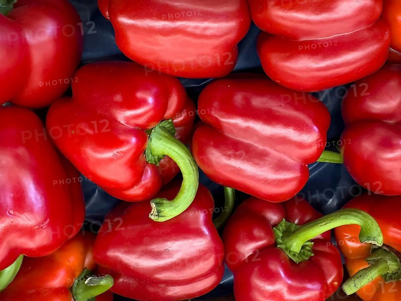 Whole red pepper Italian pepperoni displayed by greengrocers, international