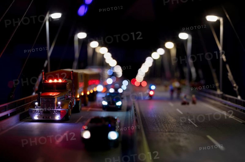 Interior view, replica of Köhlbrand Bridge in Hamburg, cars crossing bridge, miniature illustration, night view, Miniature Wonderland, Free and Hanseatic City of Hamburg, Germany