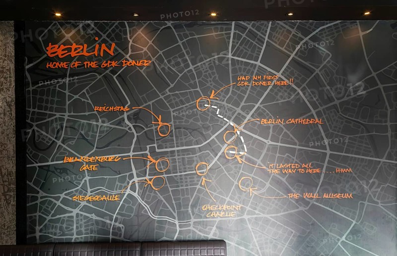 Map of Berlin inside GDK German Doner Kebab takeaway restaurant in city centre, Exeter, Devon, England, UK