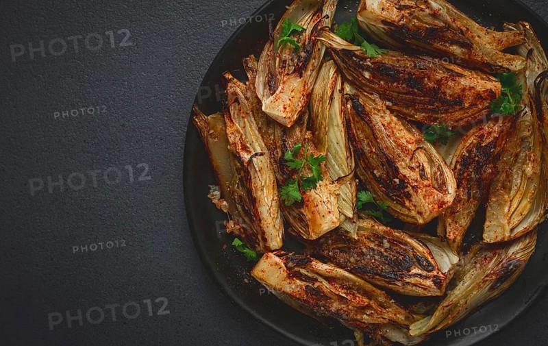 Baked, oven-baked fennel, with spices, in olive oil, homemade, no people
