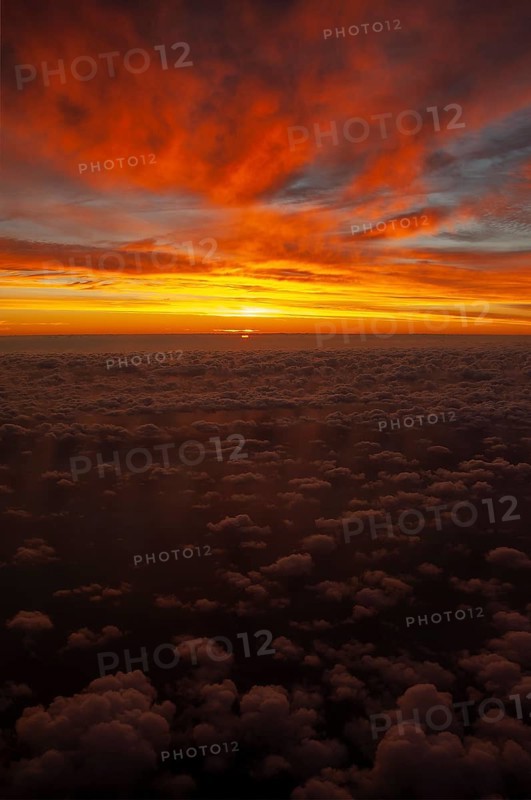 View from airplane window at sunrise