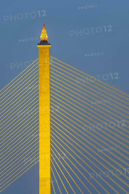 The illuminated Rama VIII Bridge, a cable-stayed bridge across Mae Nam Chao Praya, Bangkok, Thailand