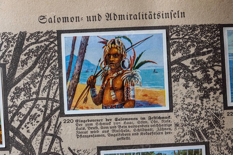 German colonies. Solomon and Admiralty Islands. Solomon Islands native in festive decoration. An anthology published by Cigaretten-Bilderdienst Dresden from 1936. Germany